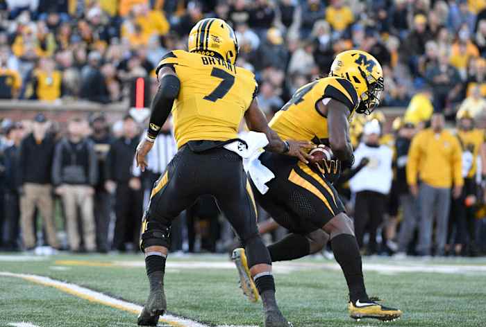 QB, Kelly Bryant hands off to Larry Rountree III